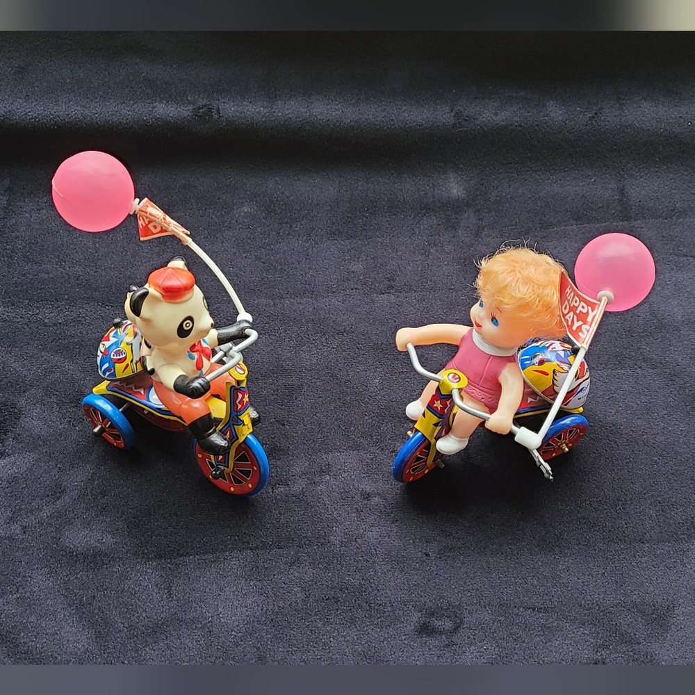 Vintage happy days wind up tin toys